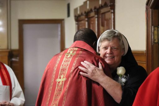 Sr. Krista embraces Fr. Freddy